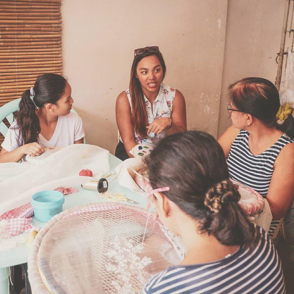 Cha socializing with friends made during her workshops